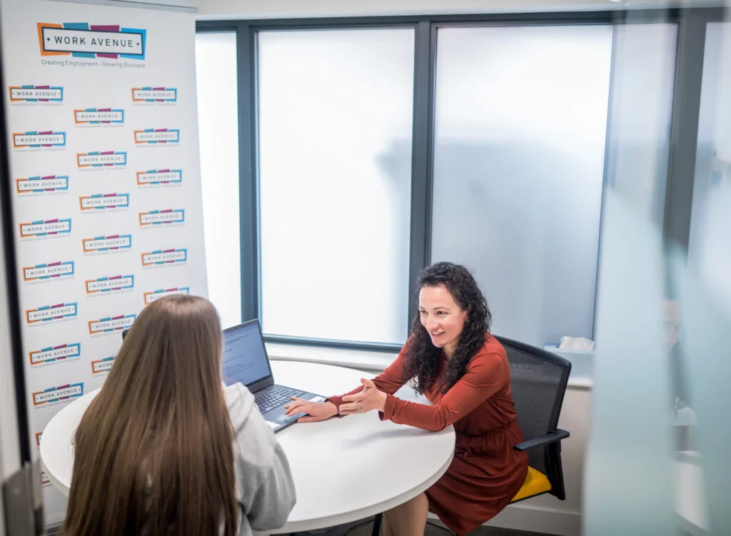 A Work Avenue adviser in a one-to-one employment support session.